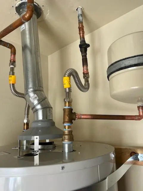Water heater installation and plumbing repair in Durham Furnace
